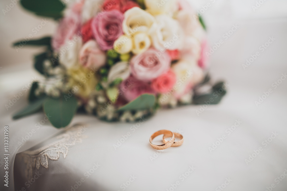 Pretty good wedding bouquet of various flowers with rings Pretty good wedding bouquet of various flowers with rings