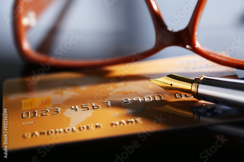 Credit card with glasses, c...