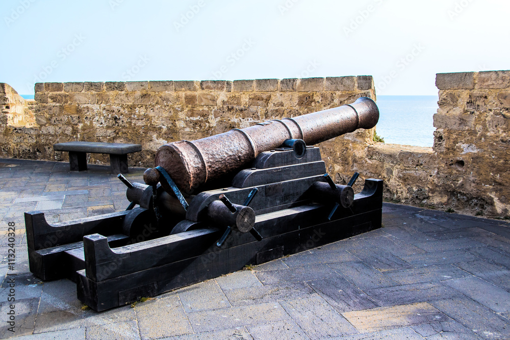 old bronze cannon in a fortress