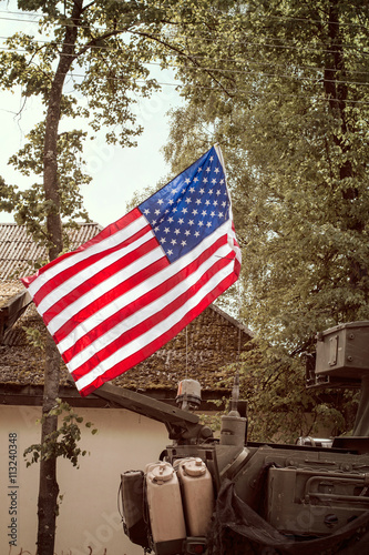 USA flag mounted on armored vehicle