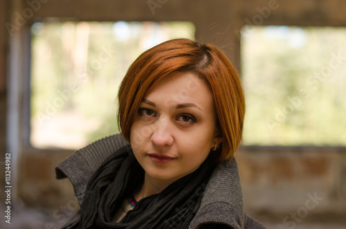 
girl posing in an abandoned building  