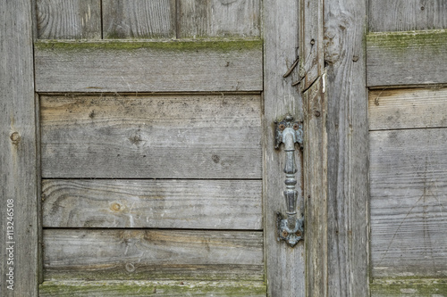 old handle on a wooden door