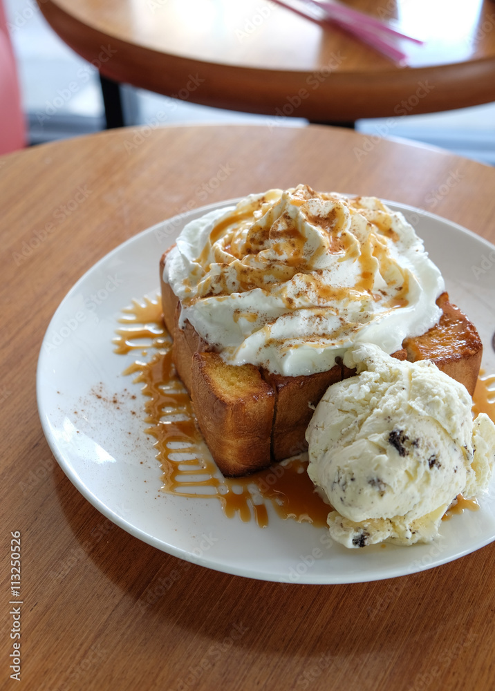 Honey Toast, Consists of bread topped with honey and ice cream Honey Toast, Consists of bread topped with honey and ice cream
