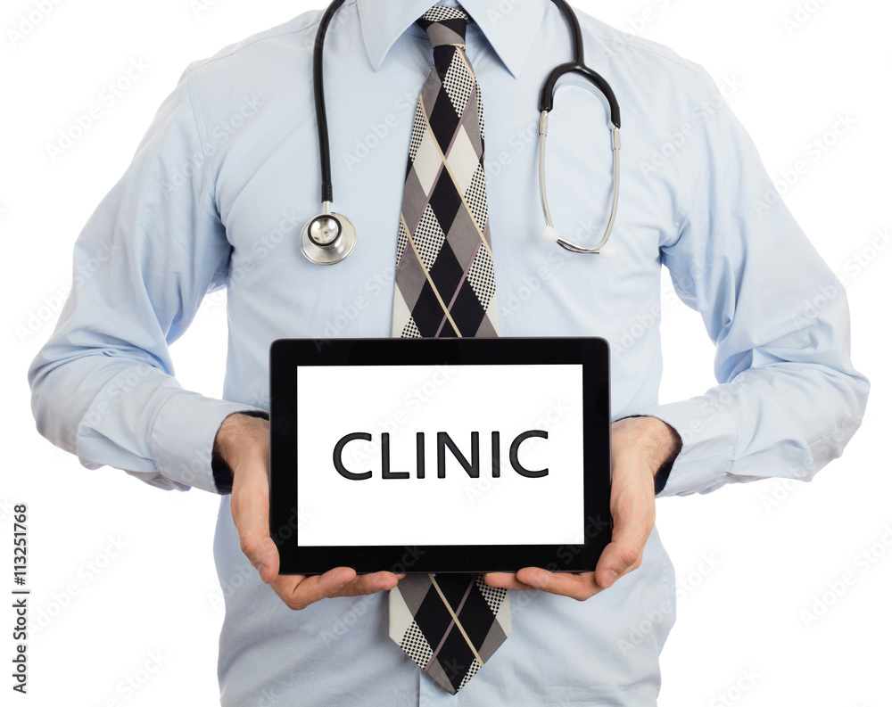 Doctor holding tablet - Clinic Doctor holding tablet - Clinic