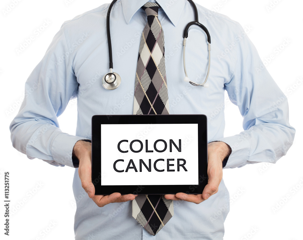 Doctor holding tablet - Colon cancer Doctor holding tablet - Colon cancer