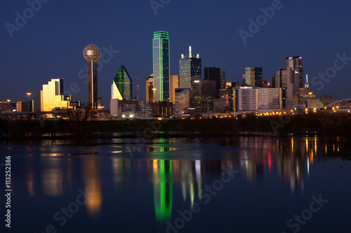 Downtowwn Dallas, Texas at night with the Trinity River in the forground photo