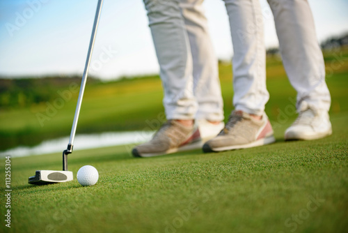 Couple playing golf