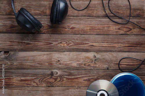 top view of music cd player equipment on wooden desk