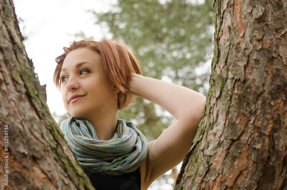 Beautiful girl portrait in the tree Beautiful girl portrait in the tree
