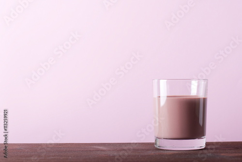 chocolate milk on a pink background