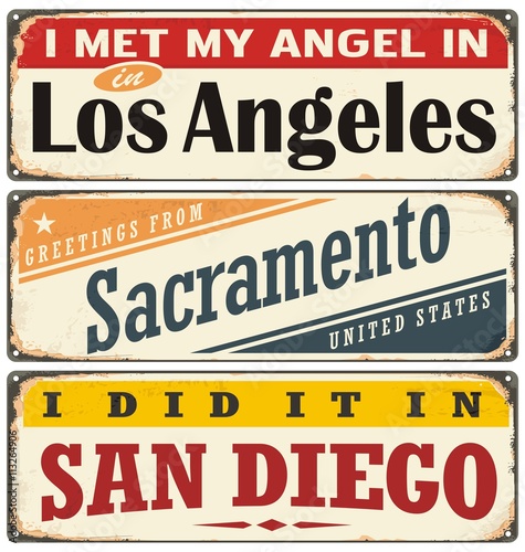 Vintage tin sign collection with USA city names