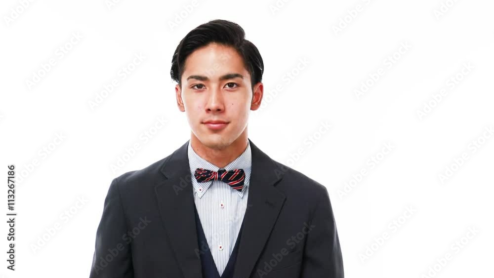 案内する笑顔のウェイター 案内する笑顔のウェイター