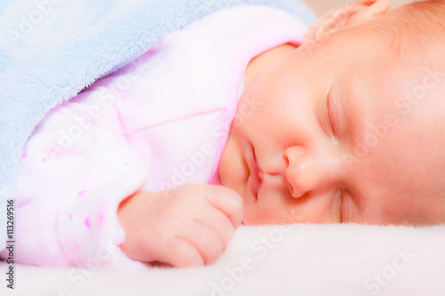 Little newborn baby girl 24 days sleeps