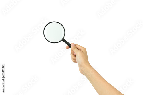 Hand holding magnifying glass isolated on white background with clipping path