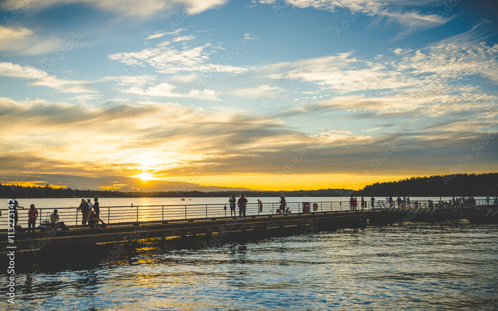 Fototapeta premium scene of walk way on the lake when sunset.