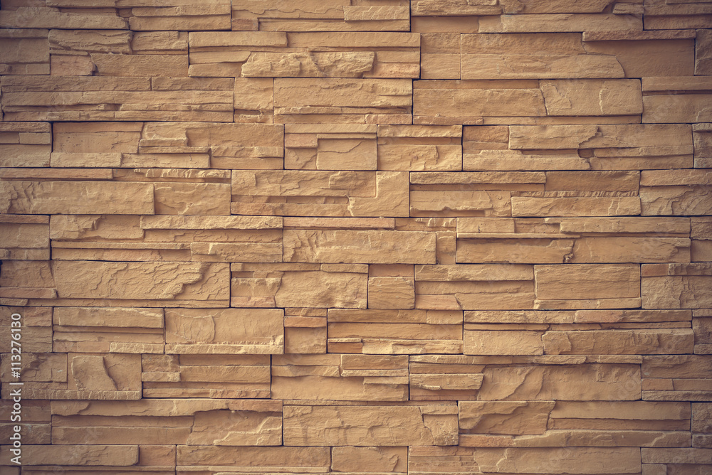 Close up brown stone wall texture background Close up brown stone wall texture background