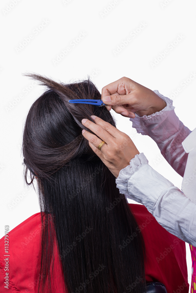Fototapeta premium Women hairdressing. Isolate on the white background
