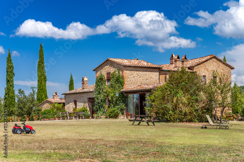 Brick house in the countryside of Tuscany, Italy. Rural landscape.