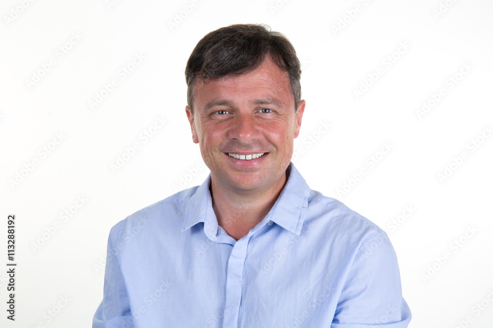 Portrait of a serious man wearing blue shirt isolated Portrait of a serious man wearing blue shirt isolated
