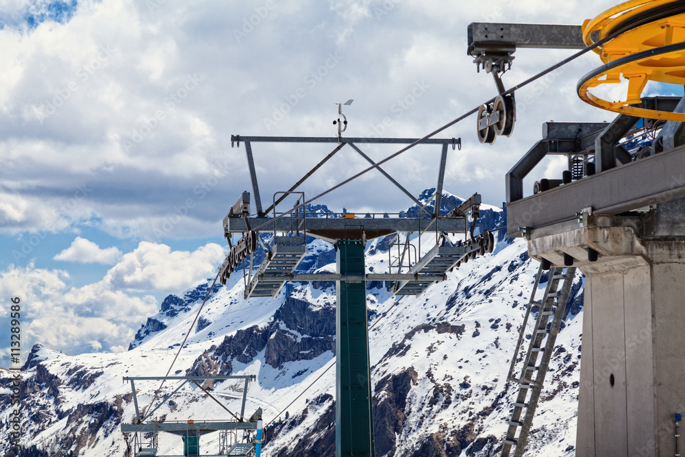 Ski lift on a background of mountain peaks in the Alps. Ski lift on a background of mountain peaks in the Alps.