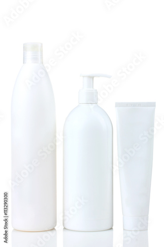 bottles with the cream on white isolated background
