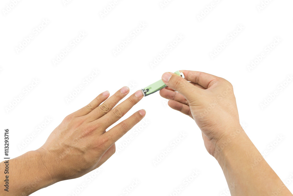 Man cutting nails with nail clipper isolated on white background Man cutting nails with nail clipper isolated on white background