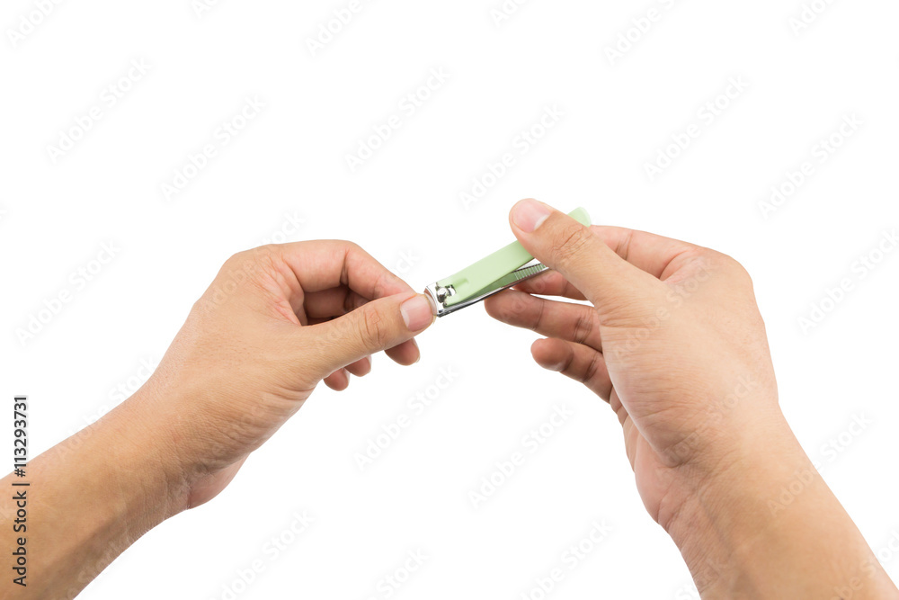 Man cutting nails with nail clipper isolated on white background Man cutting nails with nail clipper isolated on white background