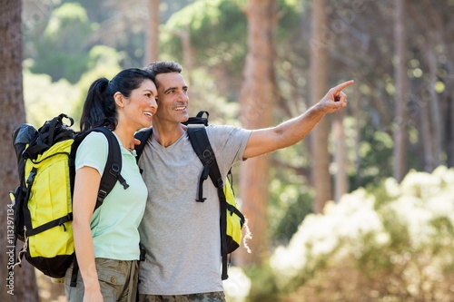 Couple pointing and hiking