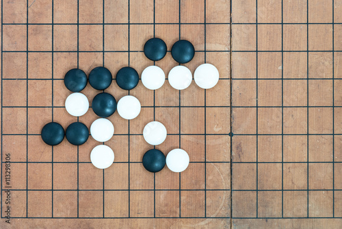 basic joseki in conner on go game board