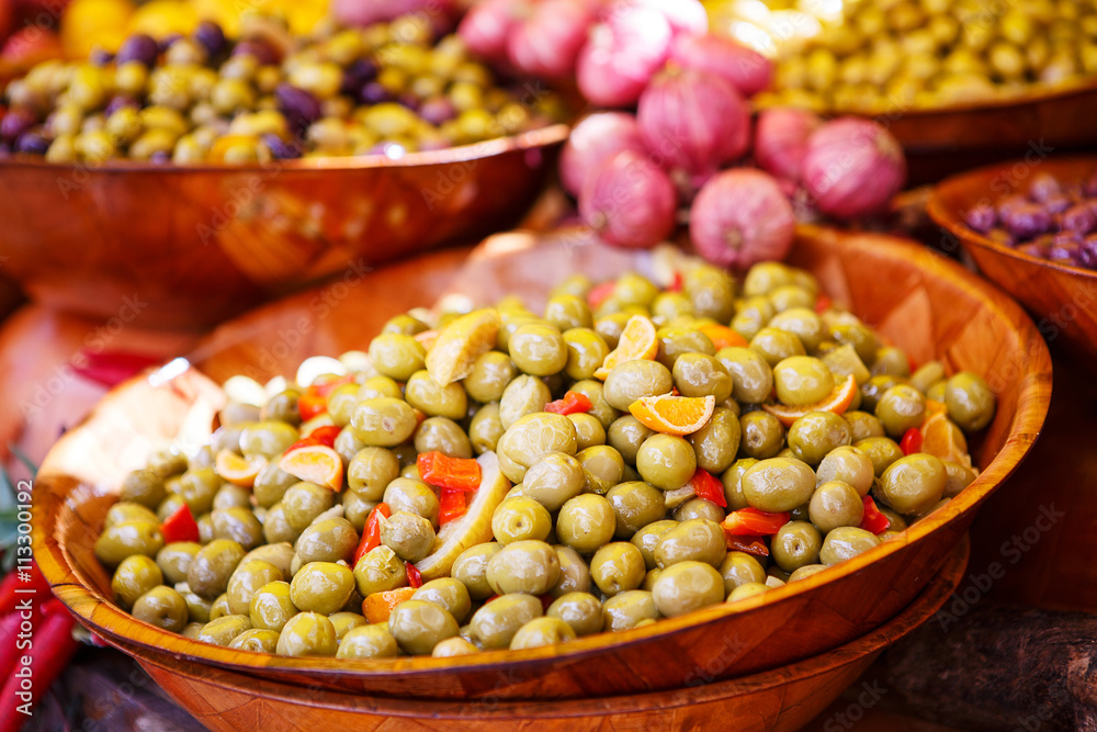 Marinated garlic and olives on provencal street market in Proven Marinated garlic and olives on provencal street market in Proven