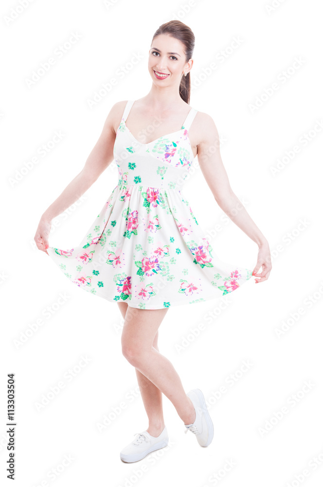 Pretty lady smiling and posing in summer dress