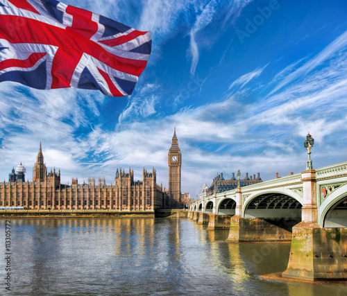 Big Ben with flag of United Kingdom in London, UK