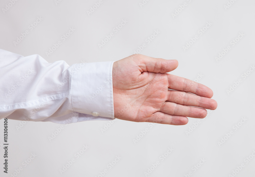 Businessman's nahd showing a direction Businessman's nahd showing a direction