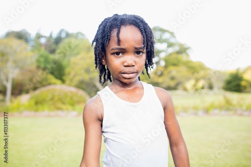 Kid posing at camera during a sunny day  © WavebreakMediaMicro