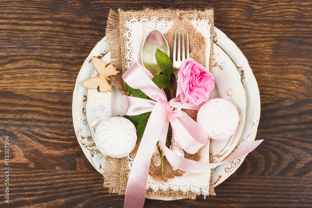 Tableware with lightpink roses and marshmallows Tableware with lightpink roses and marshmallows