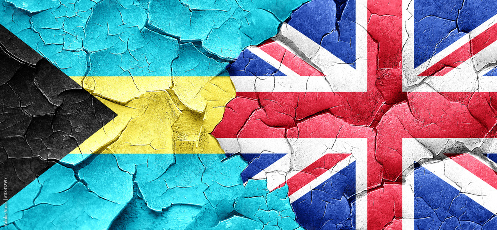 Bahamas flag with Great Britain flag on a grunge cracked wall