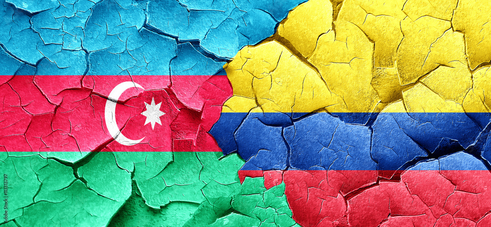 Azerbaijan flag with Colombia flag on a grunge cracked wall