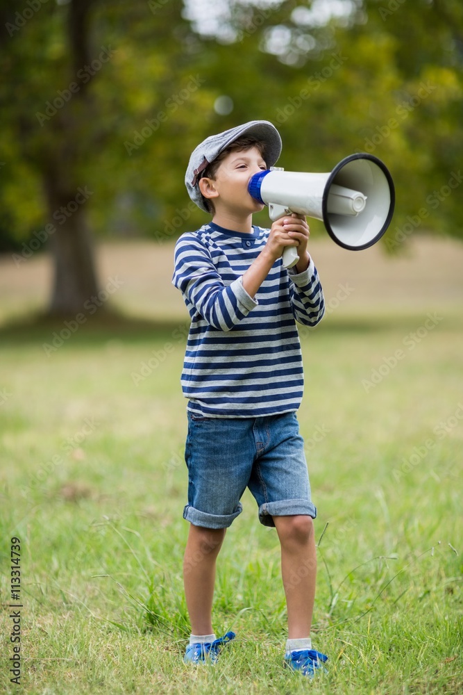Boy speaking on megaphone Boy speaking on megaphone