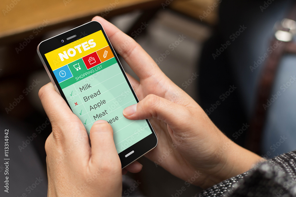street girl cheking note app with a smartphone street girl cheking note app with a smartphone
