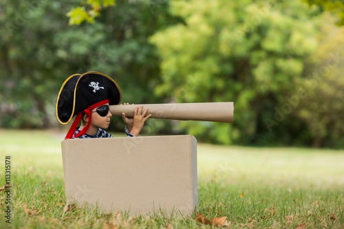 фотографія Boy pretending to be a pirate