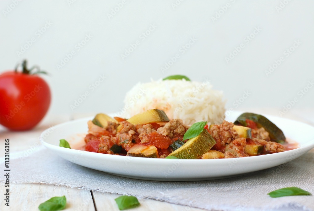 Spicy mincemeat with tomatoes, basil and zucchini with basmati rice Spicy mincemeat with tomatoes, basil and zucchini with basmati rice