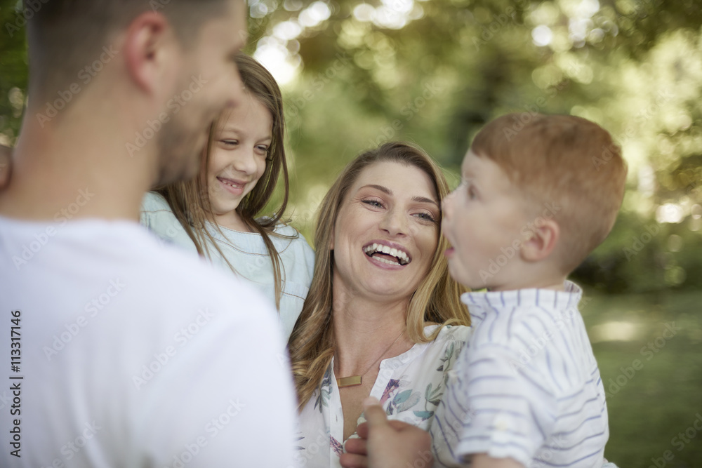 Family spending sunny day in the garden