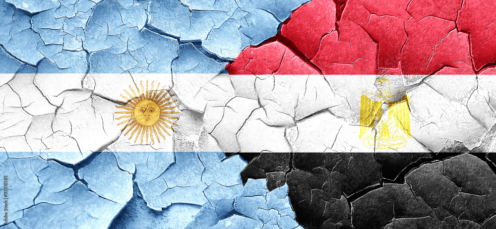 Argentina flag with egypt flag on a grunge cracked wall