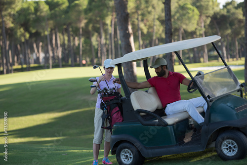 couple in buggy on golf course © .shock