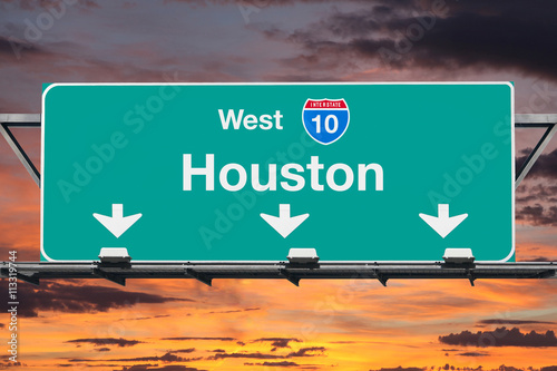 Houston Interstate 10 West Highway Sign with Sunrise Sky photo