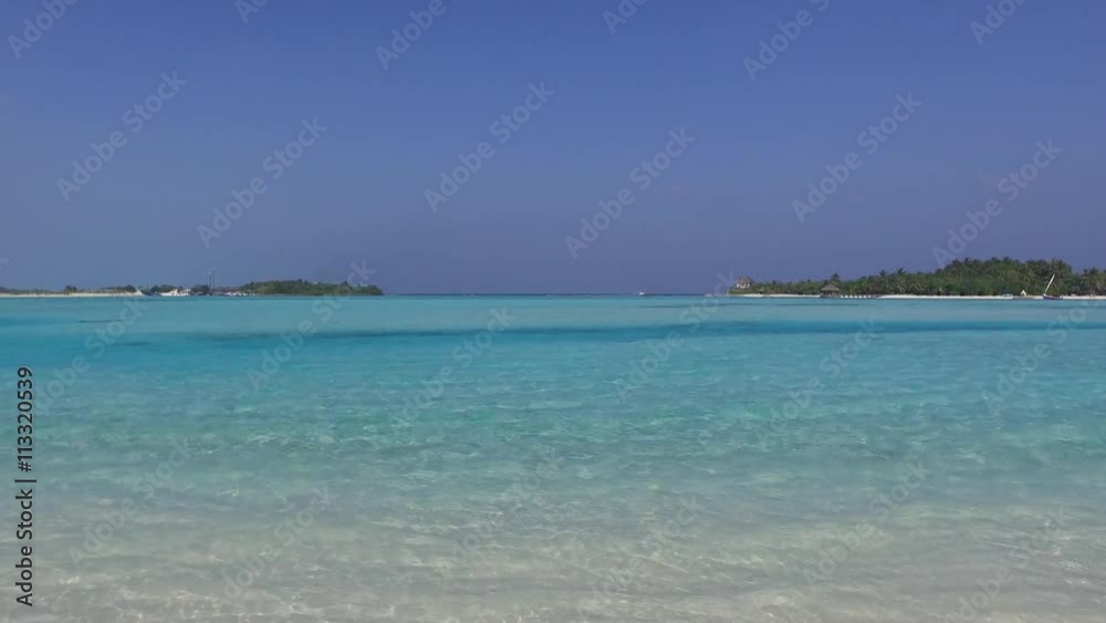 blue sea lagoon on maldives beach blue sea lagoon on maldives beach