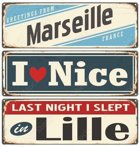 Retro tin sign collection with French cities