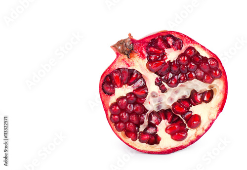 ripe pomegranate on a white background.