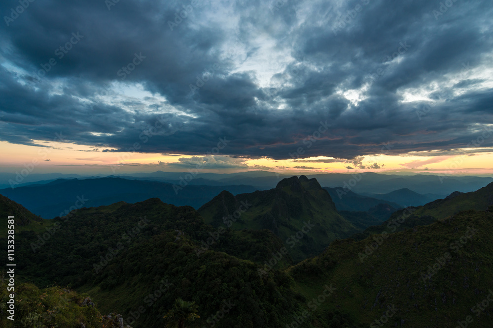 Colorful cloud view of mountains sunset summer landscape with pe Colorful cloud view of mountains sunset summer landscape with pe