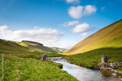 River Coquet flows from the Cheviot Hills through Upper Coquetdale Valley in Northumberland National Park